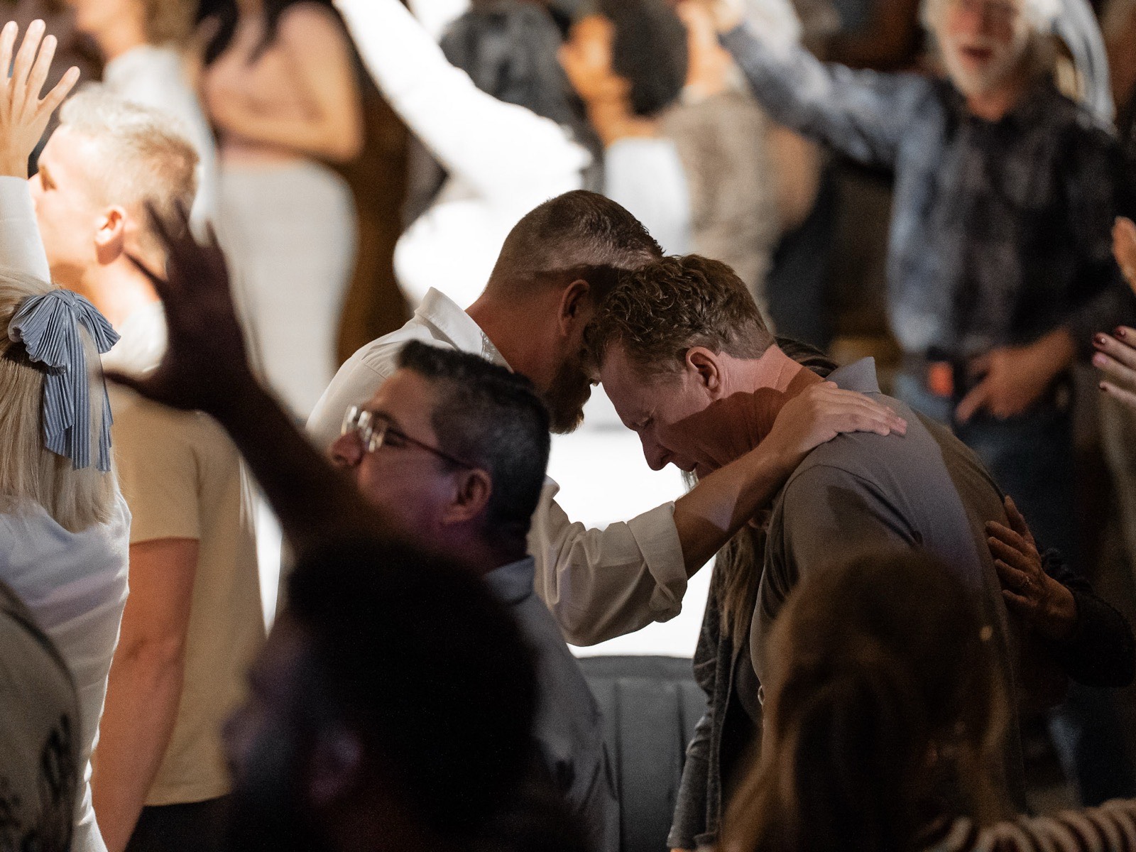 Congregation worshipping and praying together