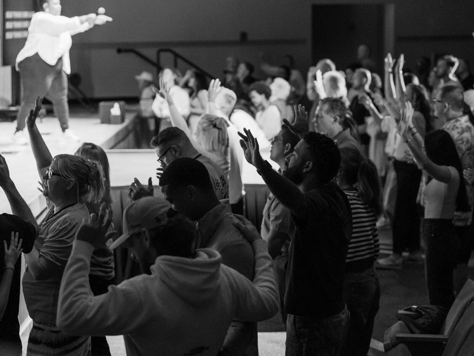 Woman worshipping at Legacy Church